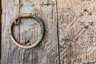 Khiva, Xorazm Region, Uzbekistan, Central Asia. Antique brass door knocker. Art Print